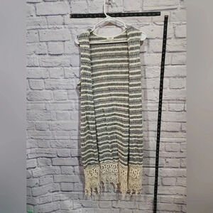 Sleeveless, open-front, knee-length Oddy brand sweater Size Large